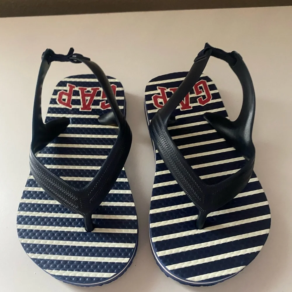 2 pairs Gap flip flops sz 10. NWOT blue/white striped. NWT neon orange striped.